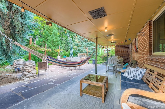 7875 W 21st Ave, Lakewood, CO 80214 - view of patio with outdoor dining area and a grill