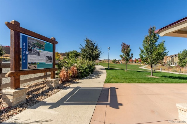 view of home's community featuring a yard