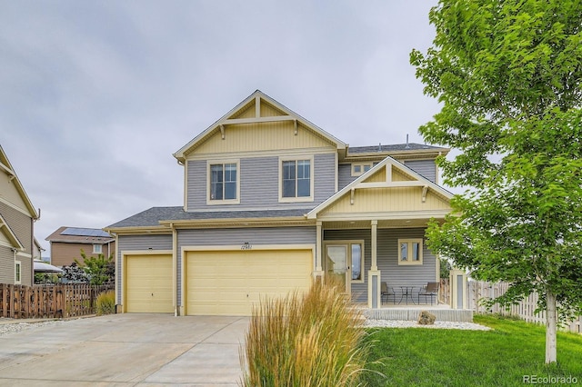 12981 E 108th Way, Commerce City, CO 80022 - craftsman house with covered porch, an attached garage, driveway, and a shingled roof