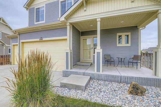 12981 E 108th Way, Commerce City, CO 80022 - covered porch with a garage and concrete driveway