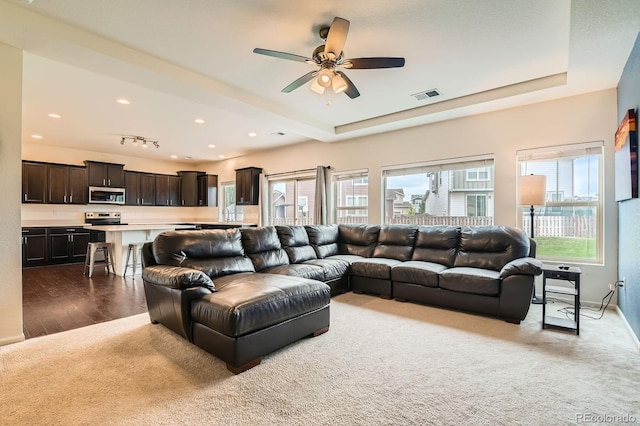 12981 E 108th Way, Commerce City, CO 80022 - living area with carpet floors, ceiling fan, and recessed lighting