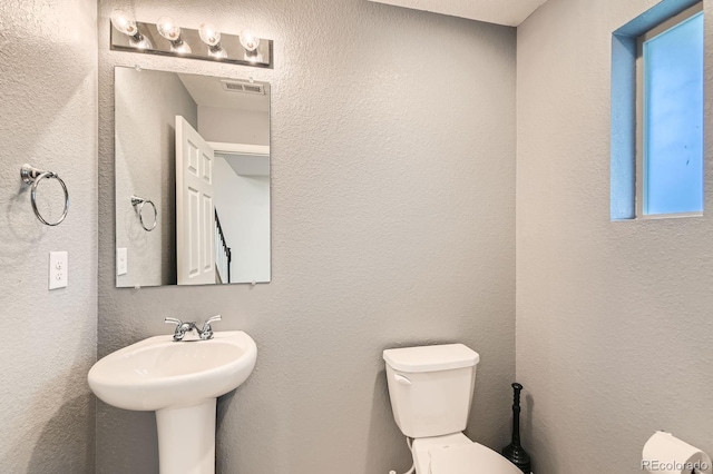 12981 E 108th Way, Commerce City, CO 80022 - bathroom with toilet and a sink