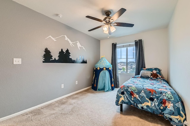 12981 E 108th Way, Commerce City, CO 80022 - carpeted bedroom with a ceiling fan and baseboards
