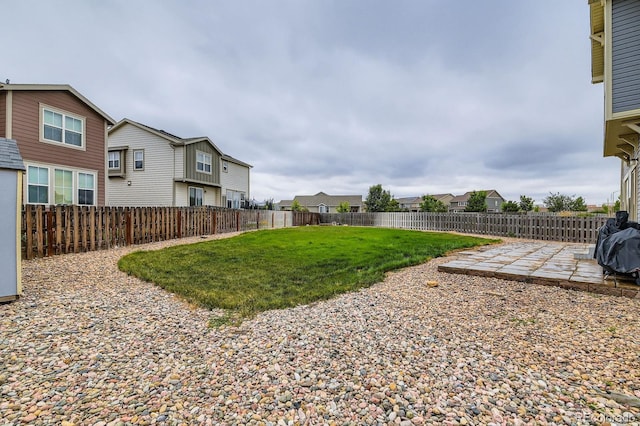 12981 E 108th Way, Commerce City, CO 80022 - fenced backyard featuring a patio and a residential view