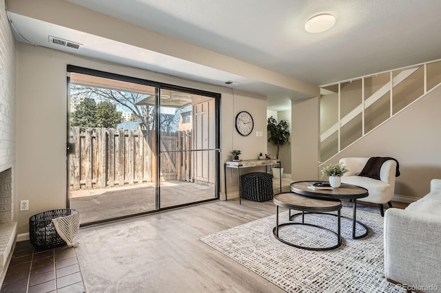 living room with wood finished floors and baseboards