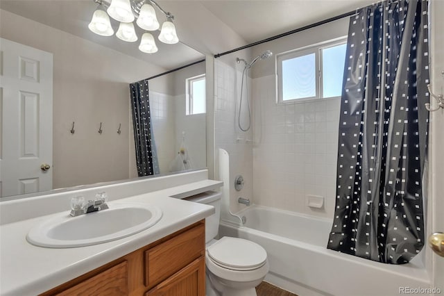 bathroom featuring shower / tub combo, toilet, and vanity
