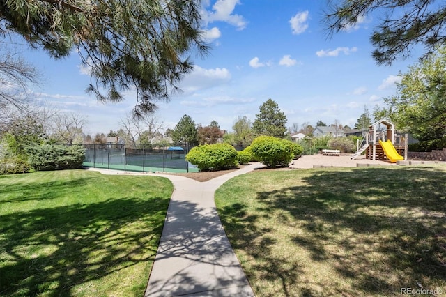 7942 S Vincennes Way, Centennial, CO 80112 - surrounding community featuring a lawn, fence, playground community, and a tennis court