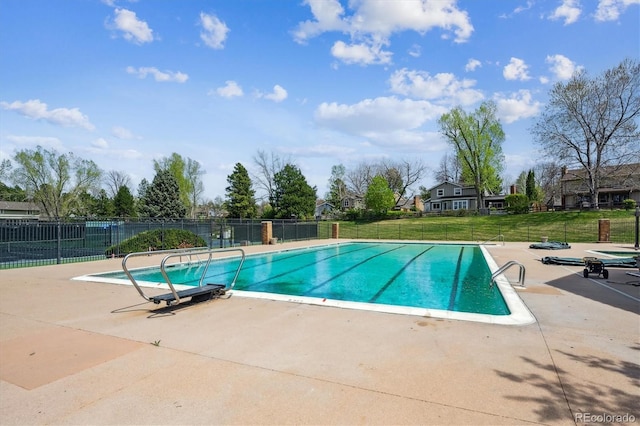7942 S Vincennes Way, Centennial, CO 80112 - view of swimming pool featuring fence, a fenced in pool, a patio, and a yard