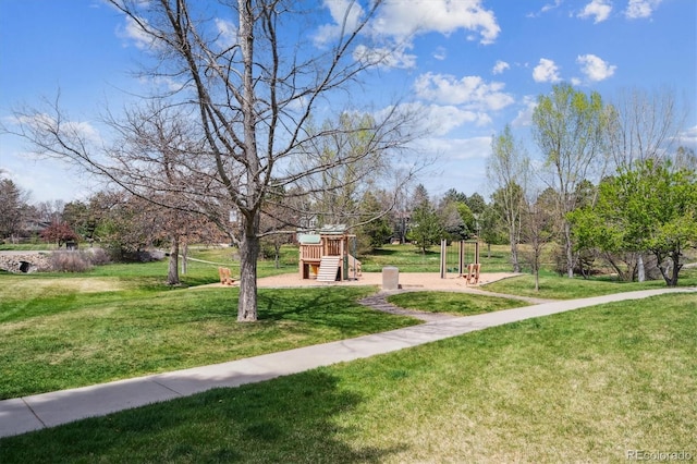7942 S Vincennes Way, Centennial, CO 80112 - view of community featuring a yard and playground community