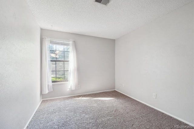 10950 W Florida Ave Unit 314, Lakewood, CO 80232 - unfurnished room with carpet floors and a textured ceiling