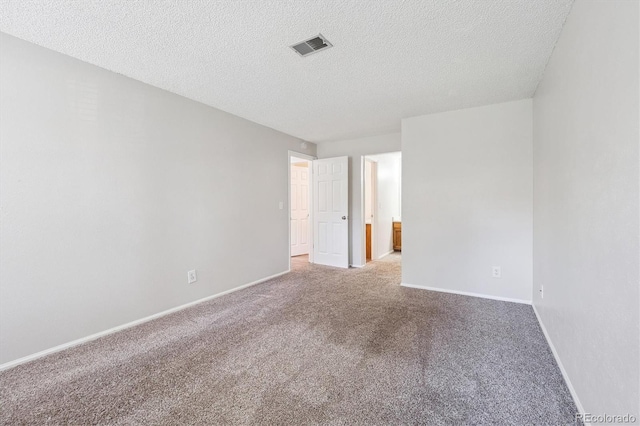 10950 W Florida Ave Unit 314, Lakewood, CO 80232 - carpeted empty room with baseboards and a textured ceiling