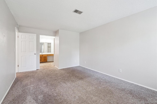 10950 W Florida Ave Unit 314, Lakewood, CO 80232 - unfurnished room featuring light carpet and a textured ceiling