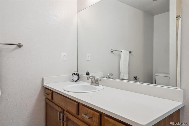 10950 W Florida Ave Unit 314, Lakewood, CO 80232 - bathroom featuring vanity and toilet