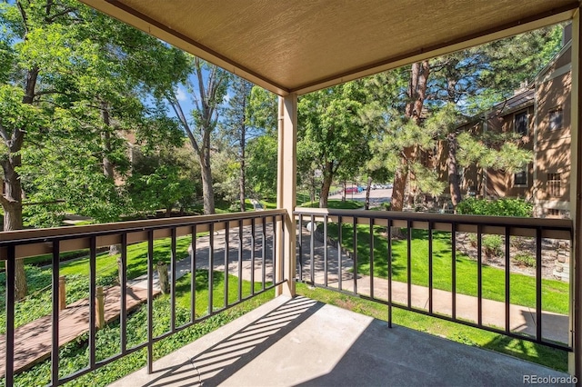 10950 W Florida Ave Unit 314, Lakewood, CO 80232 - balcony featuring view of wooded area