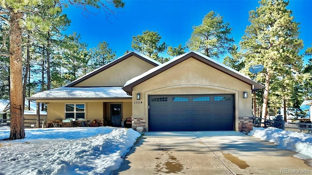 view of front of property with a garage