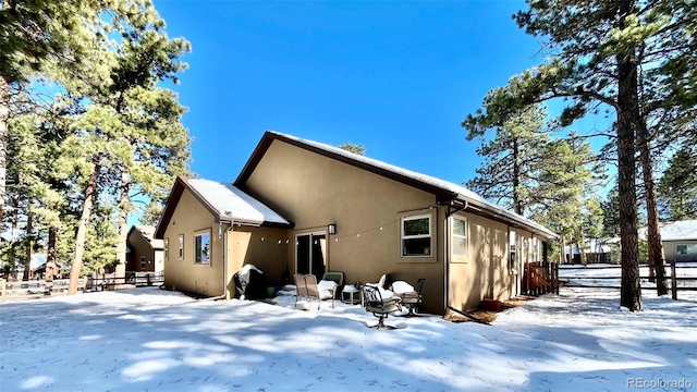 view of snow covered property