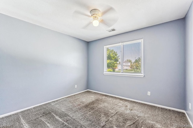 carpeted empty room with ceiling fan