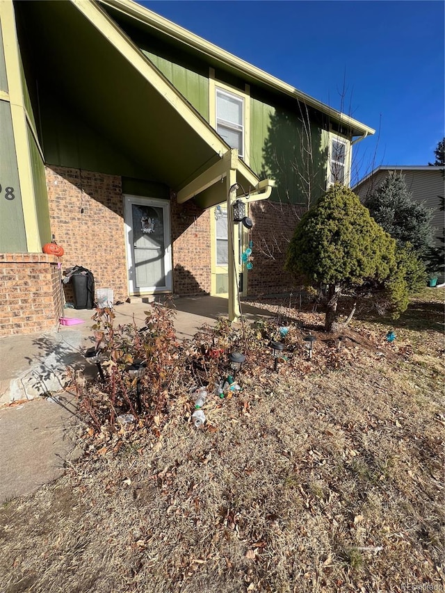 view of home's exterior featuring a patio area