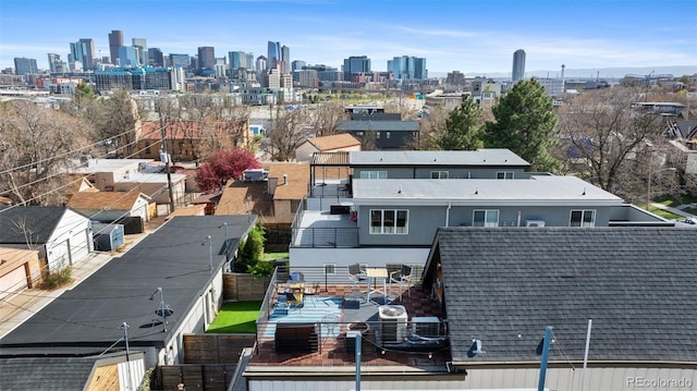 birds eye view of property featuring a view of city