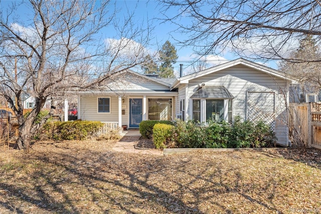 view of front of home with fence