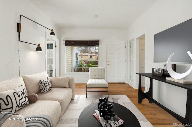 living room with wood finished floors