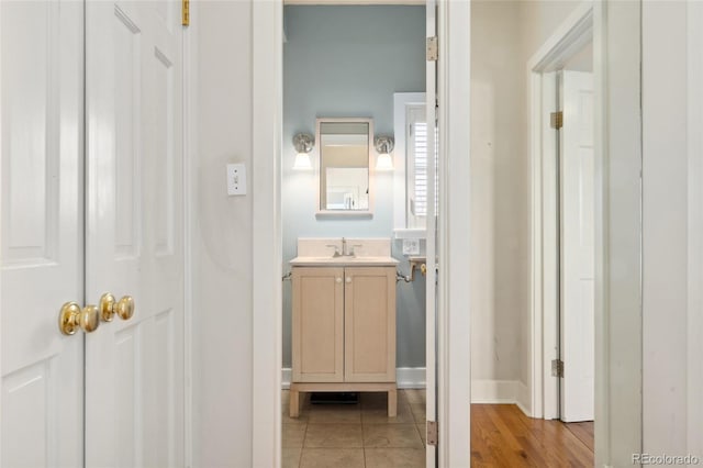 bathroom featuring vanity and tile patterned flooring