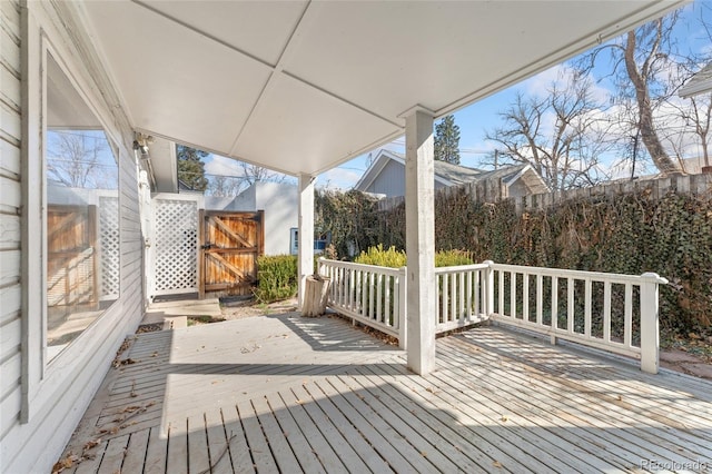 wooden deck with a gate