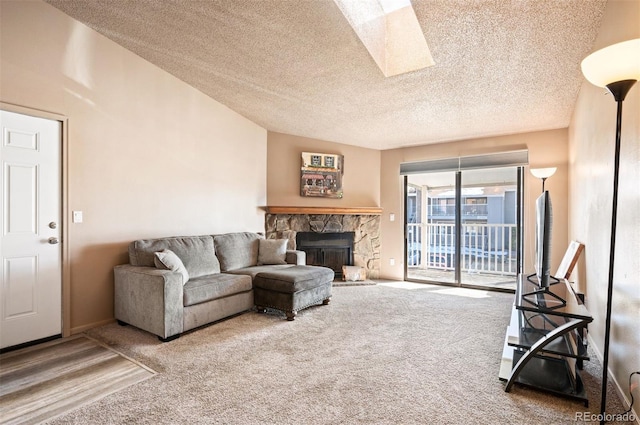 living room with carpet, a textured ceiling, and a stone fireplace