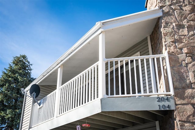 view of home's exterior with a balcony