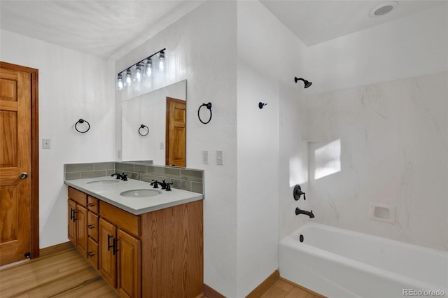 820 Schulze Ranch Rd, Westcliffe, CO 81252 - full bathroom featuring bathing tub / shower combination, baseboards, wood finished floors, and double vanity