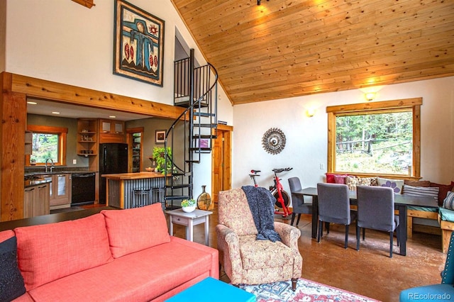 10 Bullion Mine Rd, Keystone, CO 80435 - living area with concrete floors, high vaulted ceiling, stairway, and wooden ceiling
