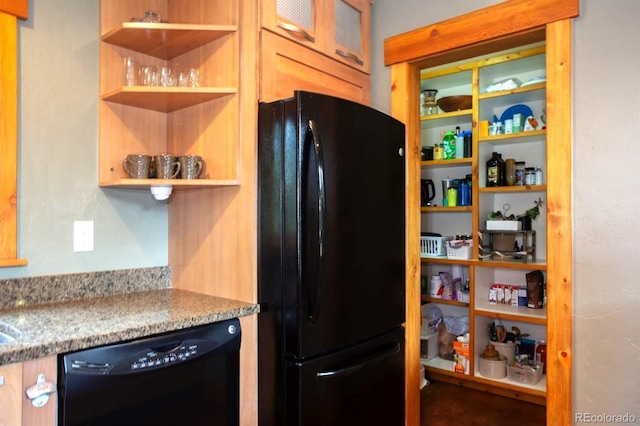 10 Bullion Mine Rd, Keystone, CO 80435 - kitchen with black appliances, open shelves, light stone countertops, and glass insert cabinets