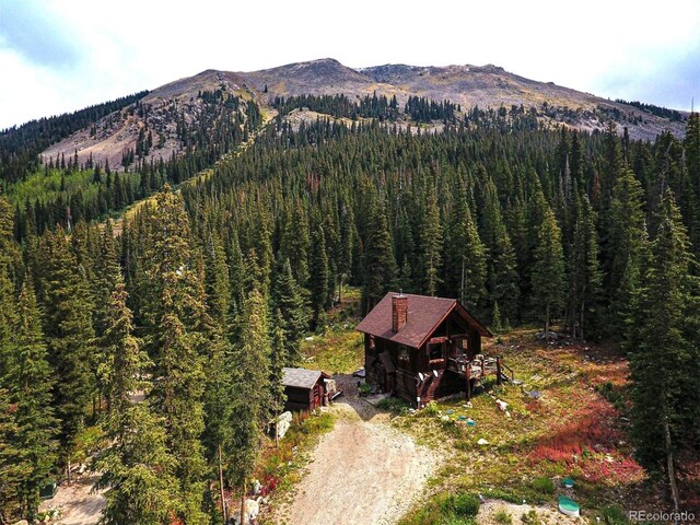 10 Bullion Mine Rd, Keystone, CO 80435 - aerial overview of property's location featuring a mountain backdrop and a forest