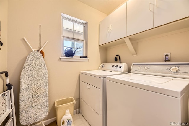 2700 W Riverwalk Cir Unit C, Littleton, CO 80123 - washroom with cabinet space, independent washer and dryer, and baseboards