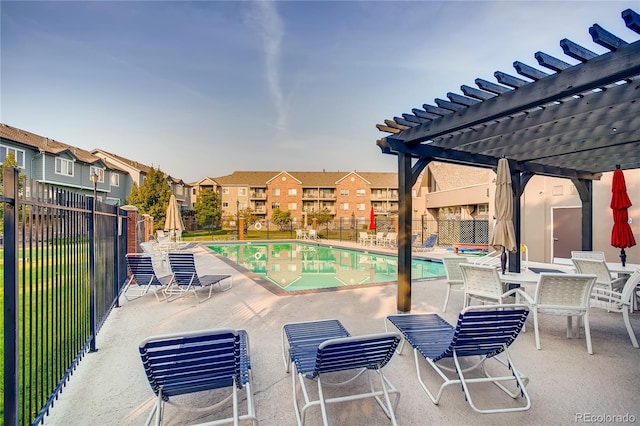 2700 W Riverwalk Cir Unit C, Littleton, CO 80123 - community pool featuring a pergola, a patio, and a residential view