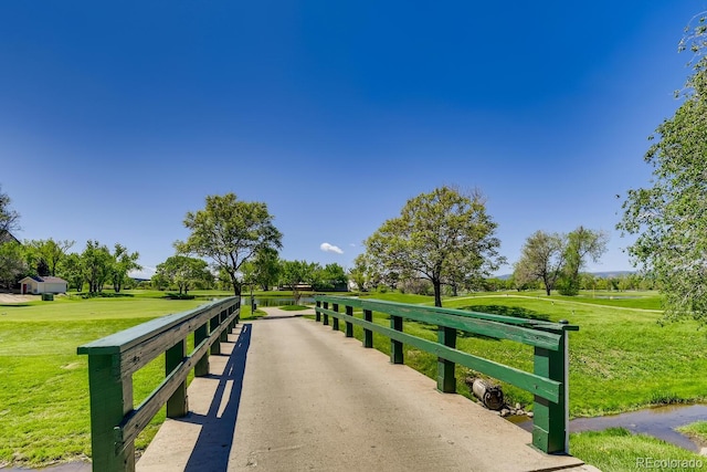 2700 W Riverwalk Cir Unit C, Littleton, CO 80123 - view of community with a yard