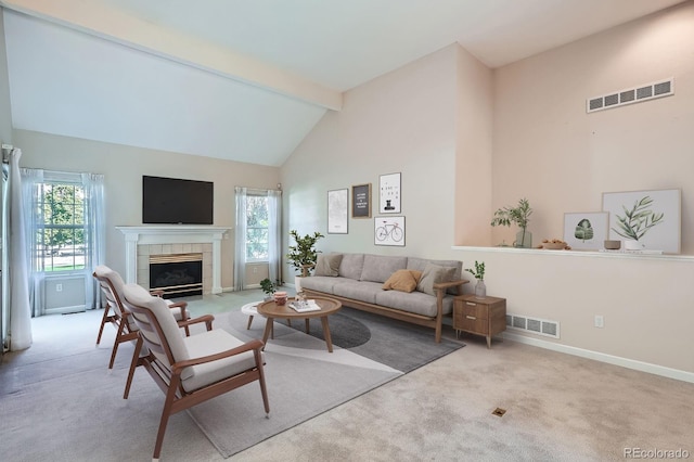 2700 W Riverwalk Cir Unit C, Littleton, CO 80123 - carpeted living room featuring high vaulted ceiling, beam ceiling, and a fireplace
