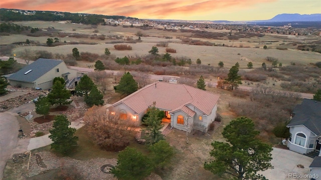 265 Ox Yoke Way, Monument, CO 80132 - aerial view at dusk of a mountain view and a rural view
