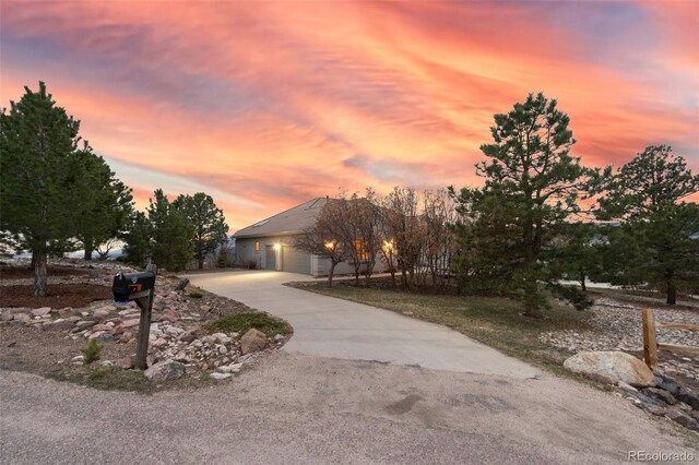 265 Ox Yoke Way, Monument, CO 80132 - view of front facade with concrete driveway and a garage