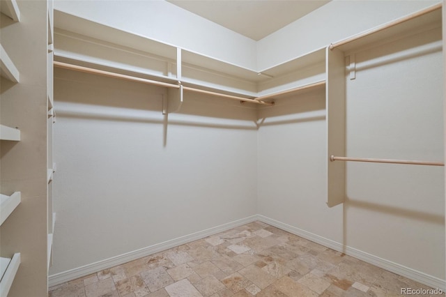 265 Ox Yoke Way, Monument, CO 80132 - spacious closet with stone finish flooring