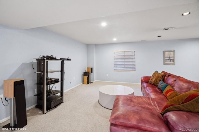 carpeted living area featuring recessed lighting, baseboards, and visible vents
