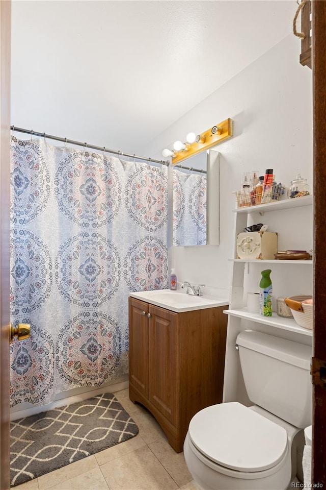 6018 S Prince St, Littleton, CO 80120 - bathroom featuring toilet, vanity, tile patterned floors, and a shower with shower curtain