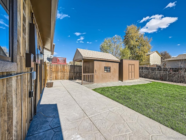 view of patio / terrace featuring a storage unit