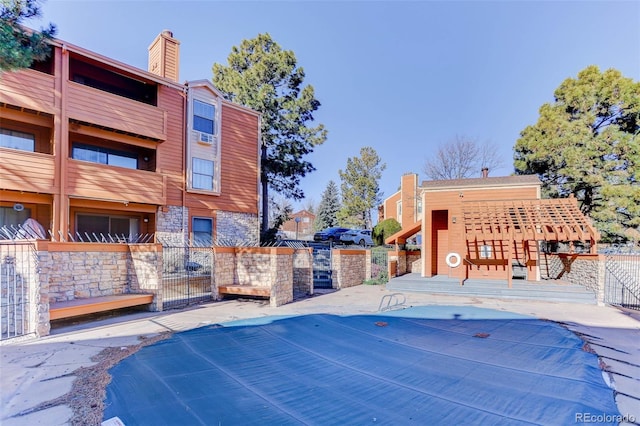 view of pool with fence