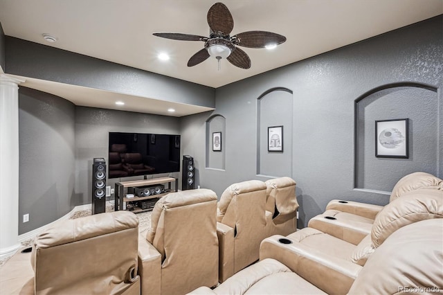 4185 Cheyenne Dr, Larkspur, CO 80118 - home theater room with a ceiling fan, recessed lighting, baseboards, a textured wall, and decorative columns