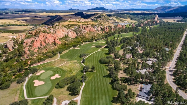 4185 Cheyenne Dr, Larkspur, CO 80118 - view of property location featuring a mountainous background and a golf course