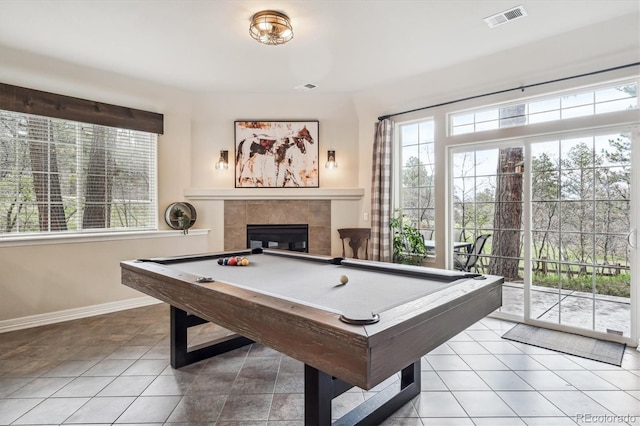 4185 Cheyenne Dr, Larkspur, CO 80118 - recreation room featuring plenty of natural light, billiards, baseboards, and a tile fireplace