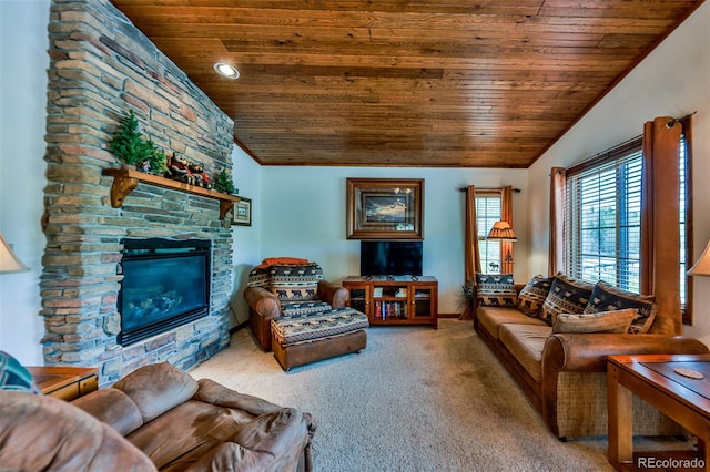 living room featuring vaulted ceiling, wooden ceiling, carpet, and a fireplace