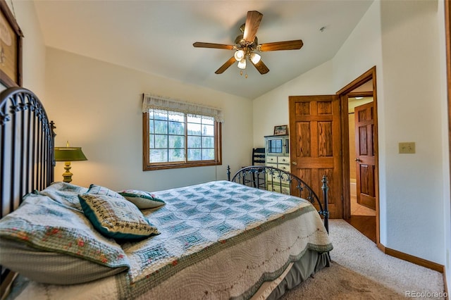 bedroom featuring carpet floors, ceiling fan, and vaulted ceiling