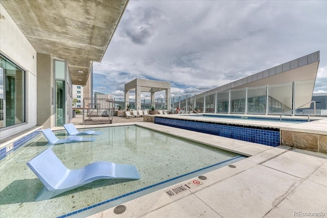 891 14th St Unit 2002, Denver, CO 80202 - community pool featuring a patio area